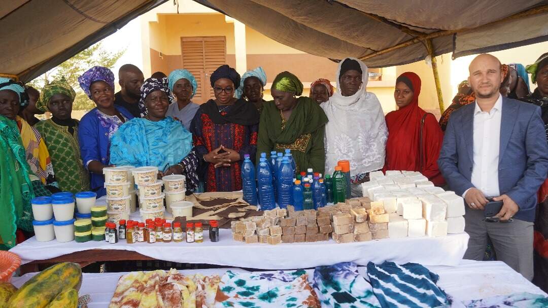 Women in Mali display handmade soaps and products at a Qatar Charity multi-service center